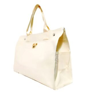 Bolso Annie – Bolsa compacta y versátil para madres, con acabado elegante y múltiples compartimentos